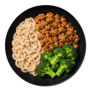 Udon au poulet haché caramélisé, sauce au tofu soyeux et brocoli