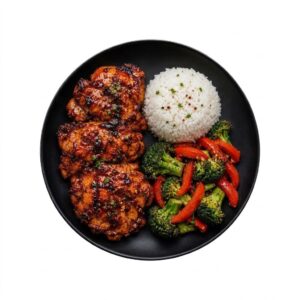 Cuisses de poulet désossés hot honey-lime , riz jasmin et légumes croquants